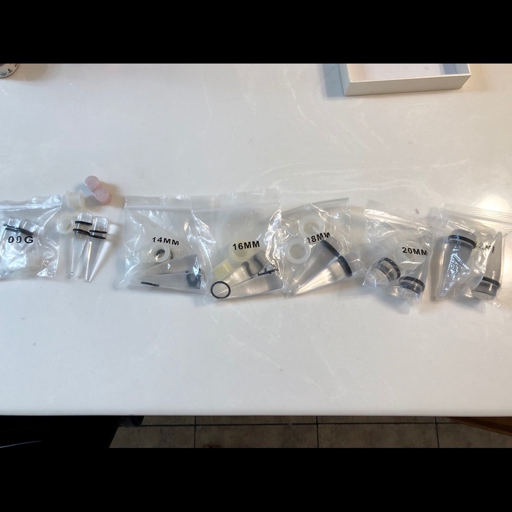 Clear ear stretching kit